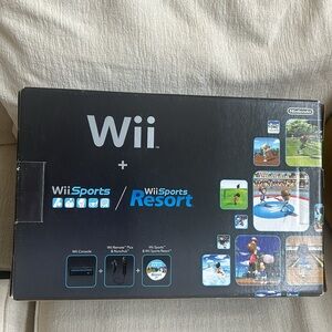 Wii console with Wii Remote & Nunchuk plus Wii sports & Wii sports Resort